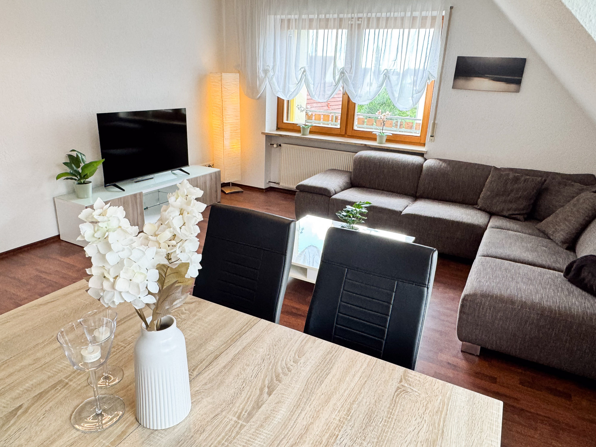 Living room with sofa and Smart TV